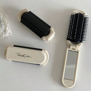 Peine portatil con espejo